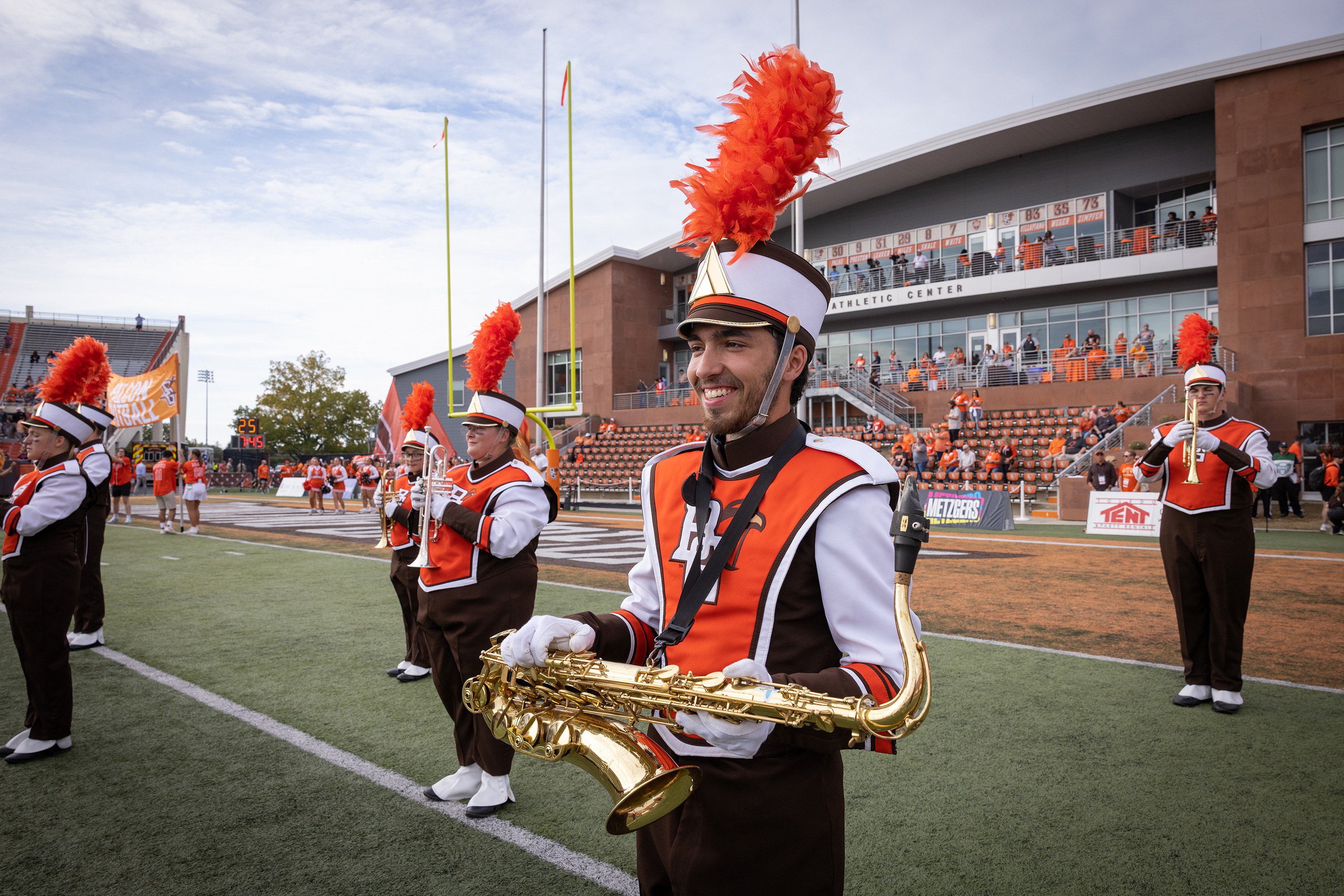 Nick Polace playing the saxophone in the marching band