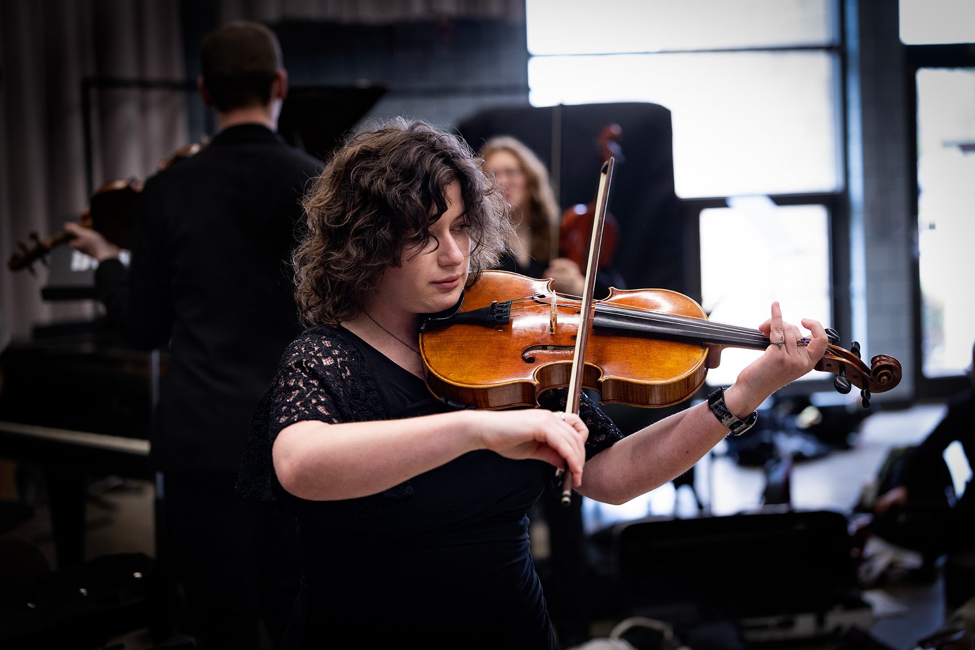 A viola player performs.