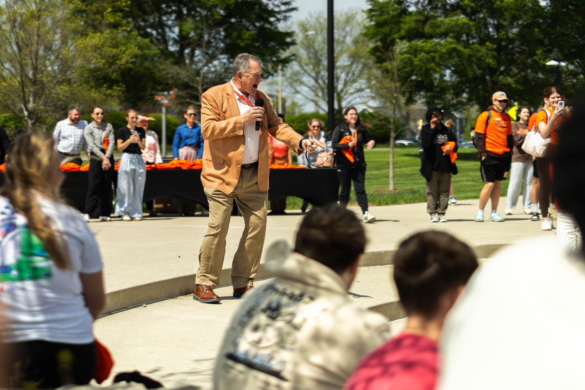 A man speaks into a microphone.