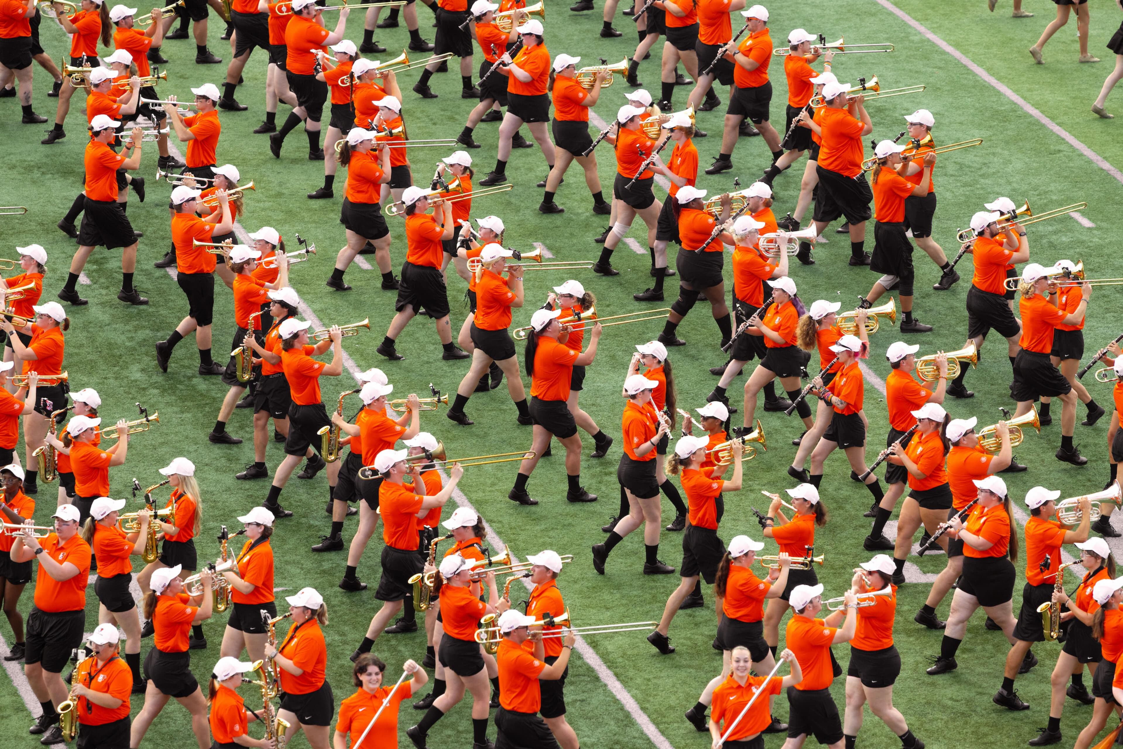BGSU Falcon Marching band marches on the field