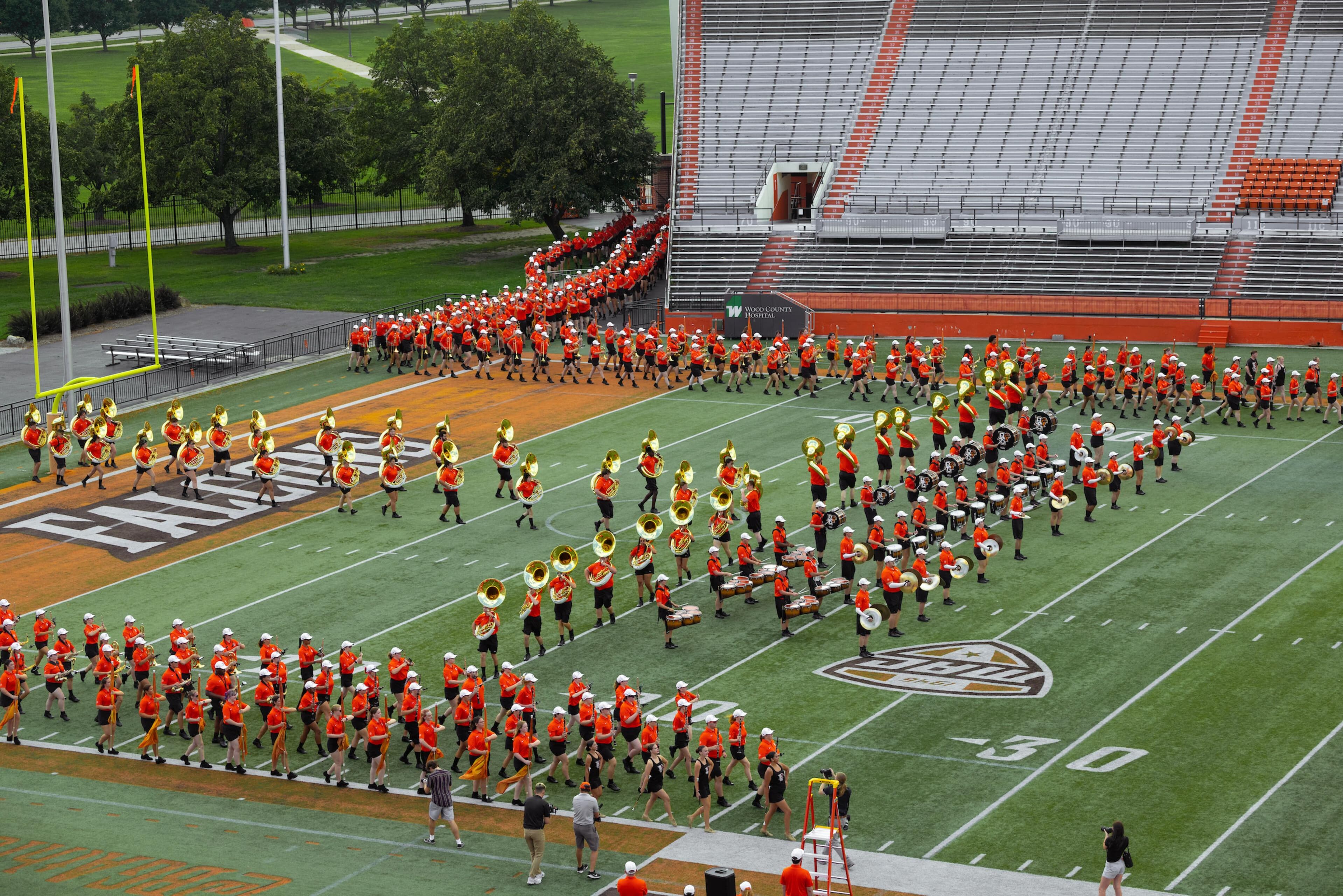 BGSU Falcon Marching band marches onto the field