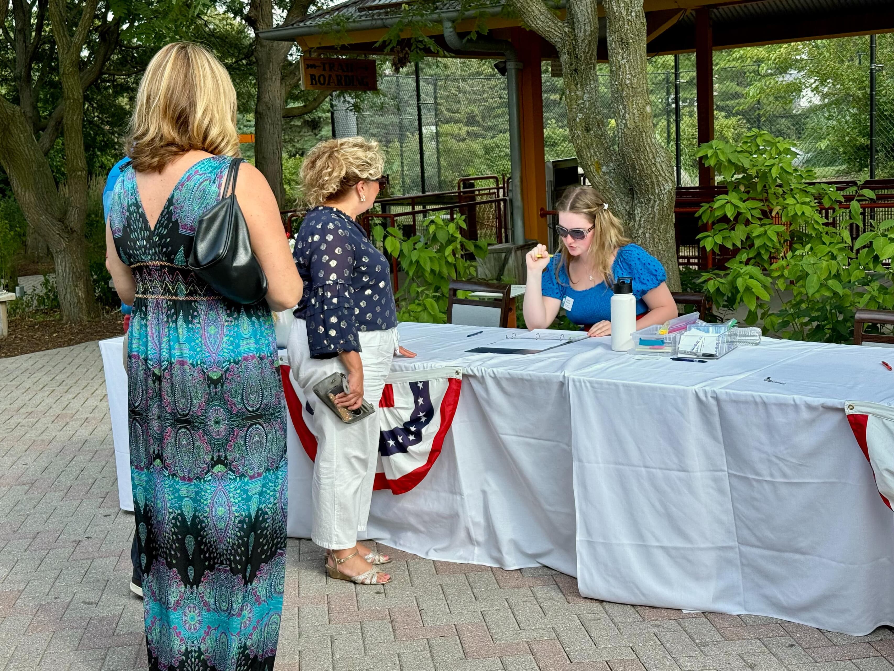 A BGSU student checks people in for an event during her internship