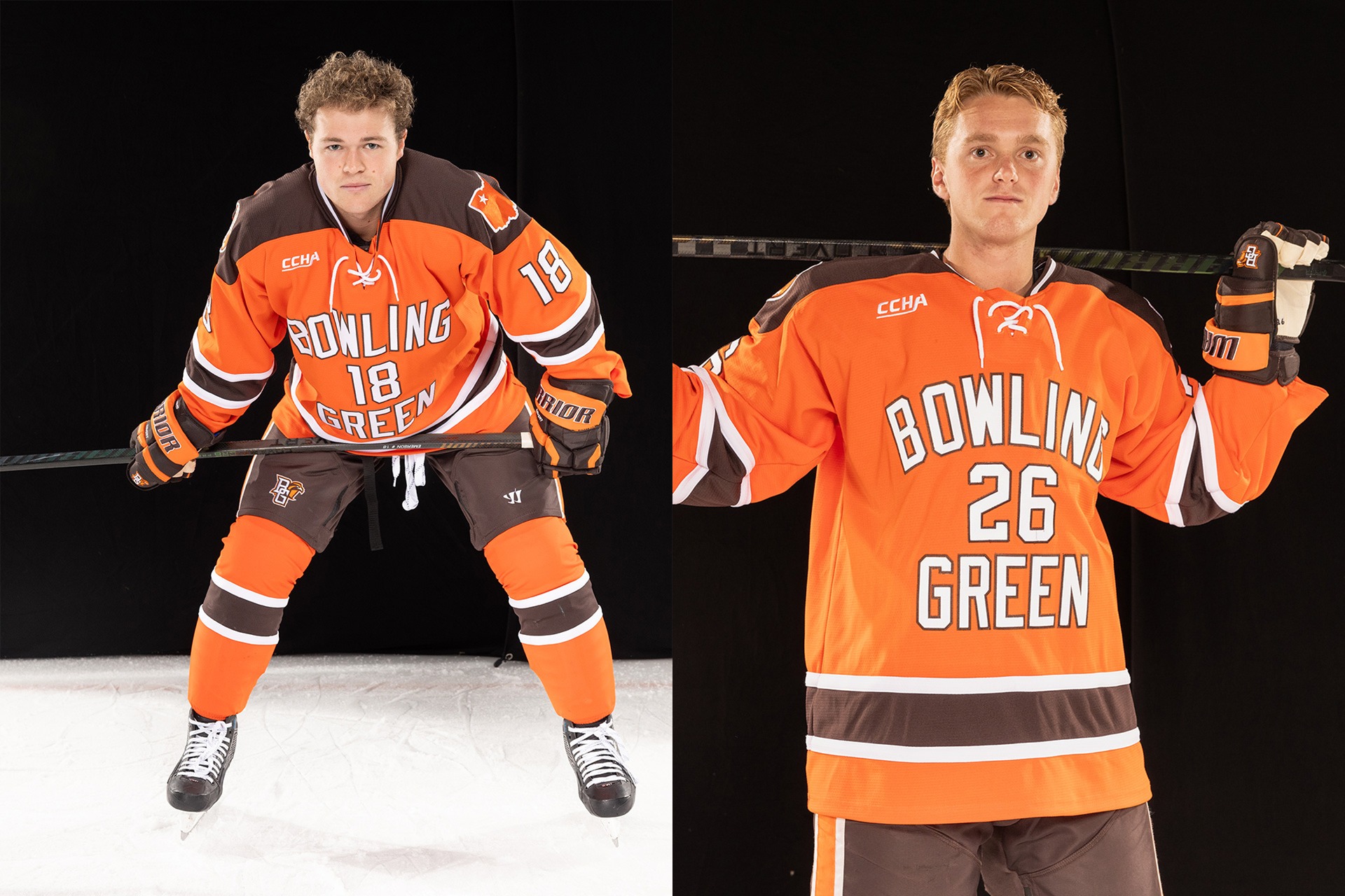 Two hockey players pose for photos