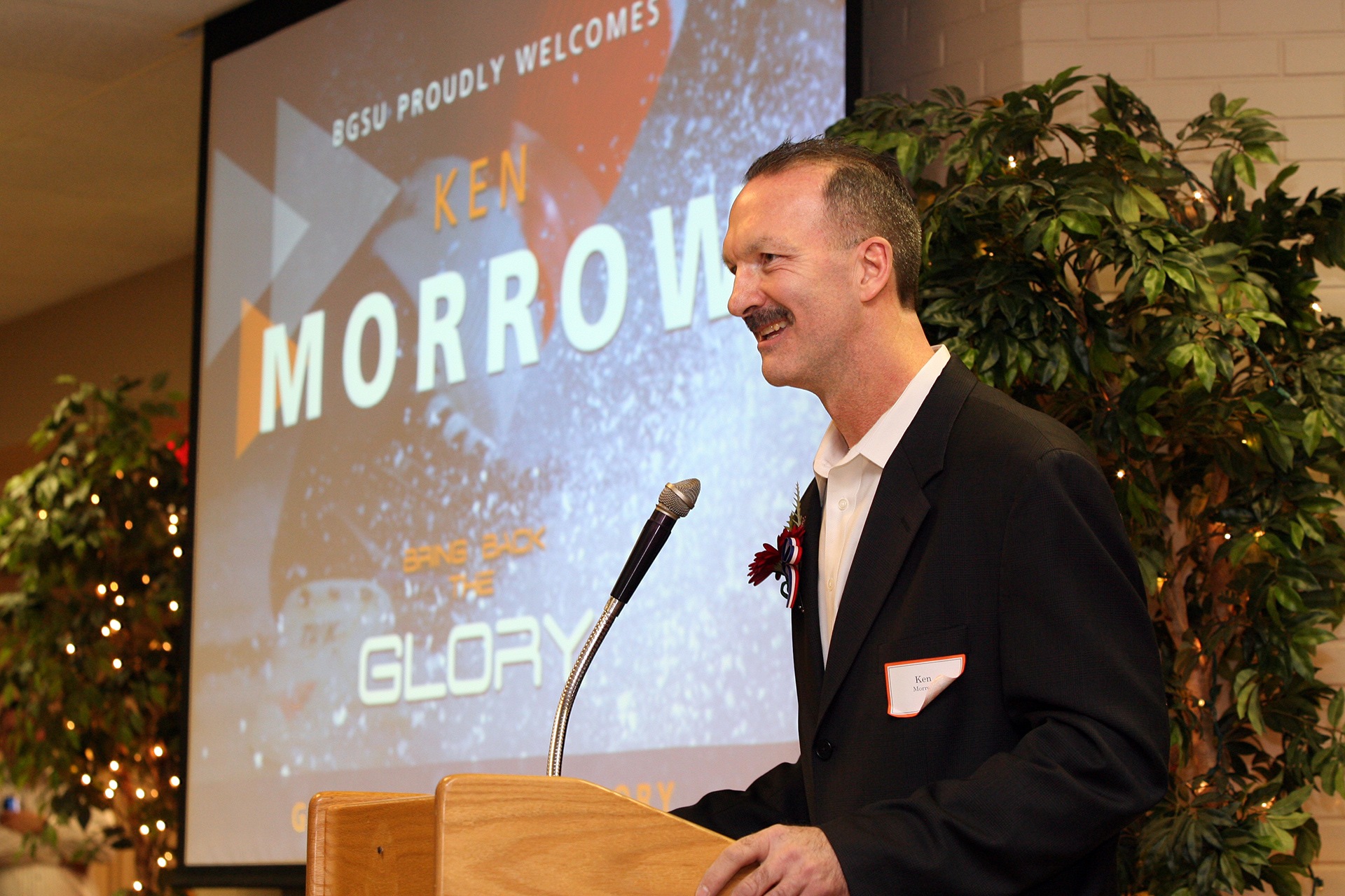 A person speaks at a podium.
