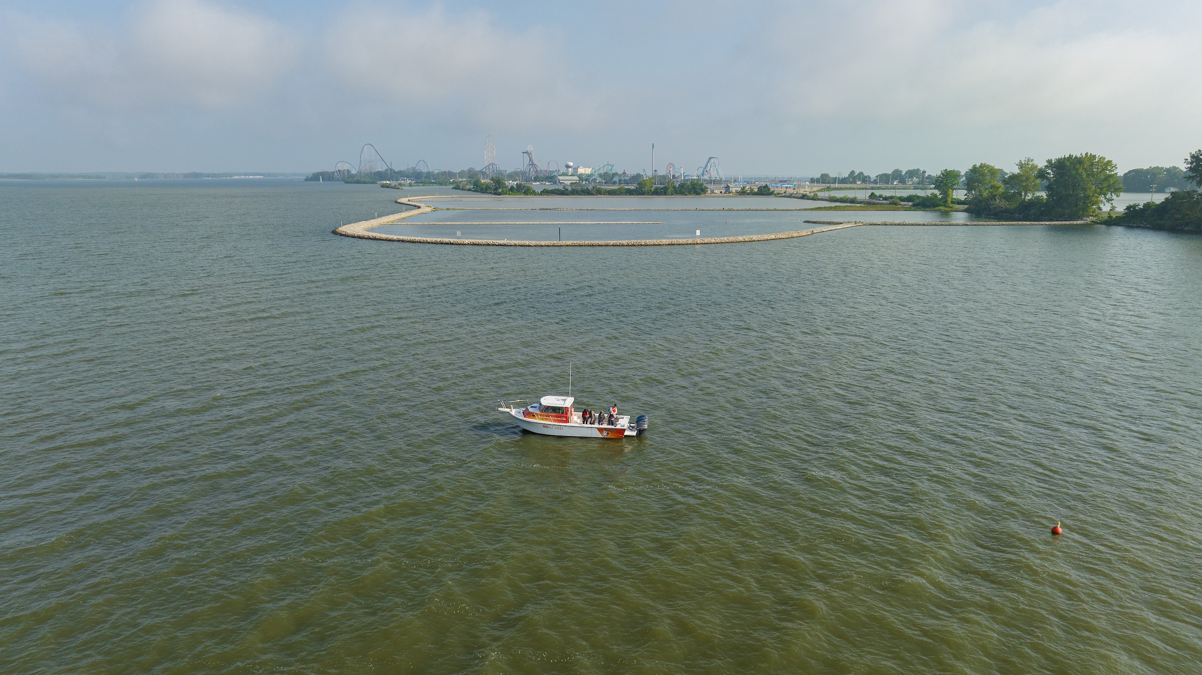 An aerial shot of a boat on Lake Erie.