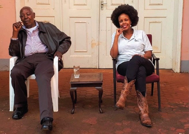 James Karugu and his daughter, Vicky pose for a photo
