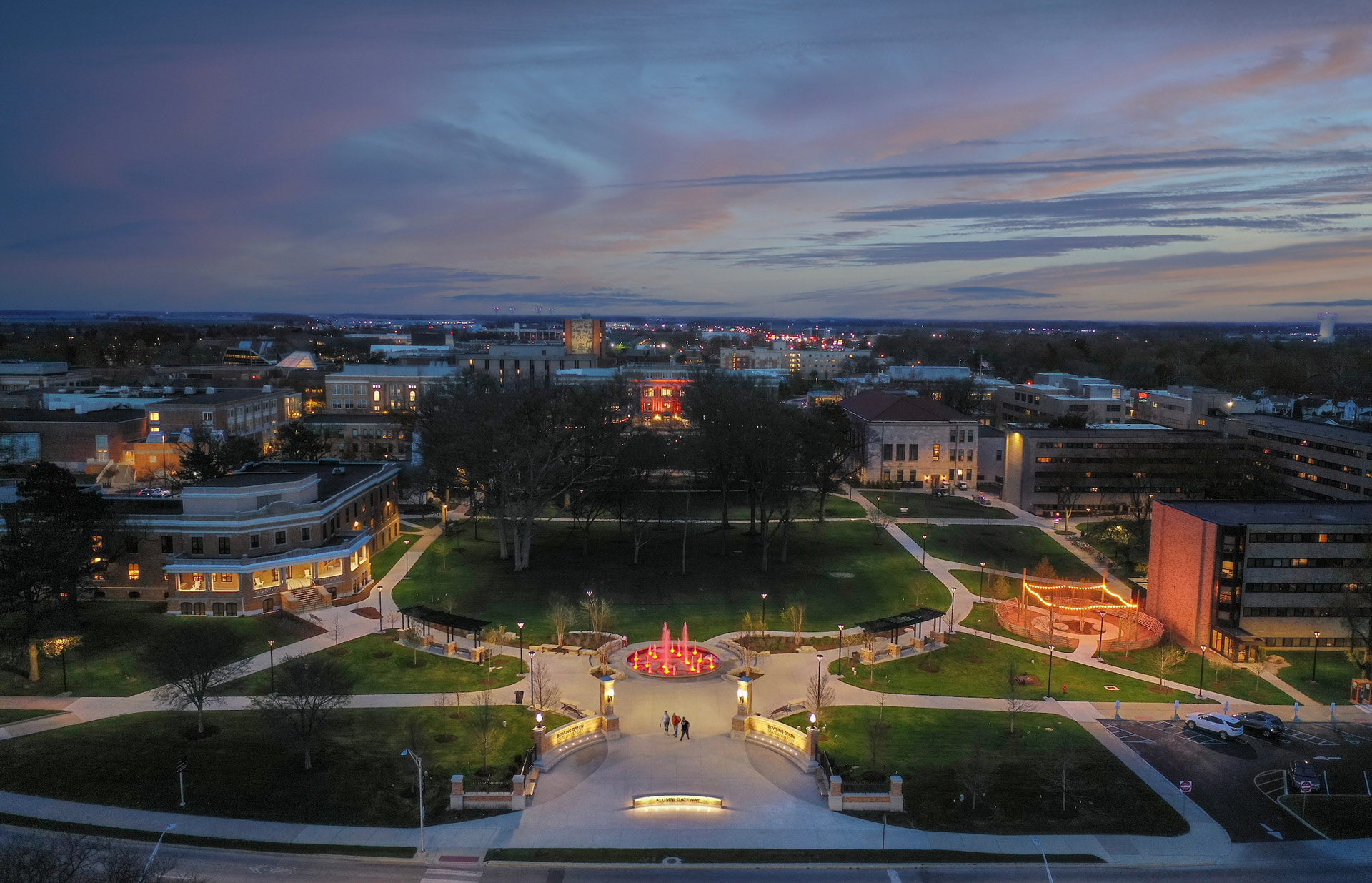 A drone image of Alumni Gateway at sunset