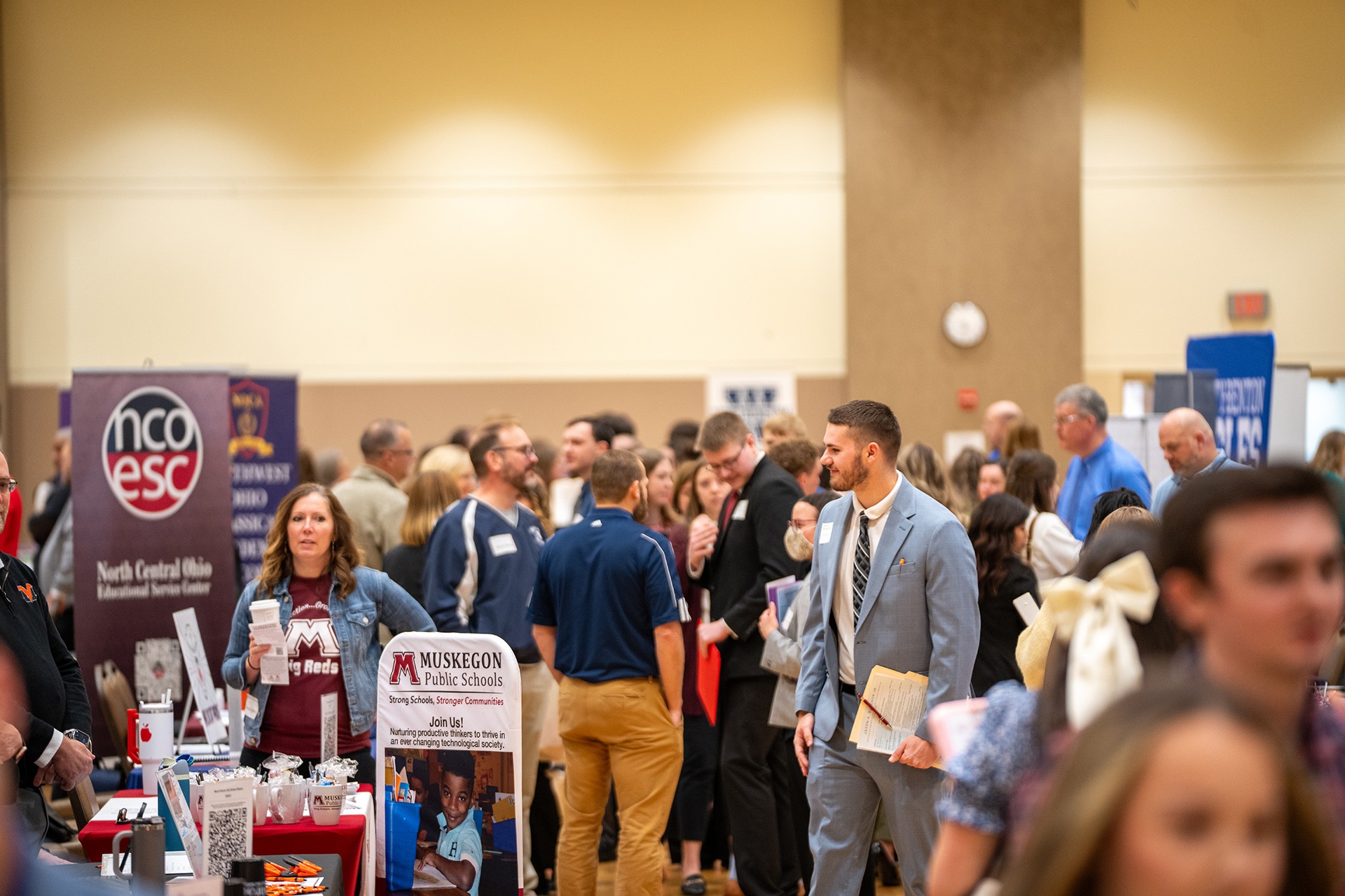 An overview shot of students at the Educator Career Fair