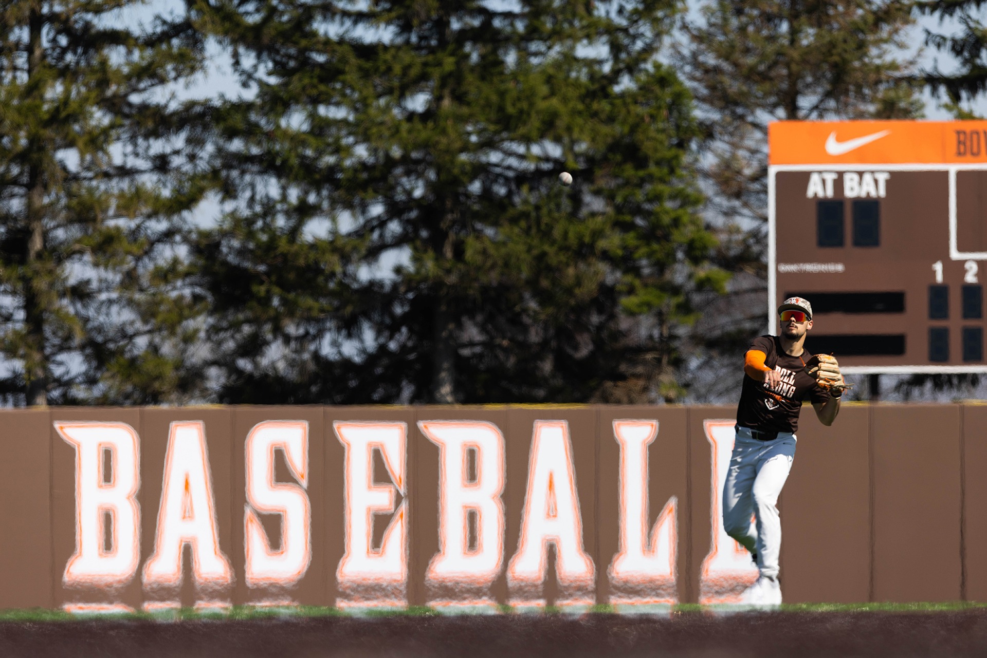 A second baseman takes infield practice.