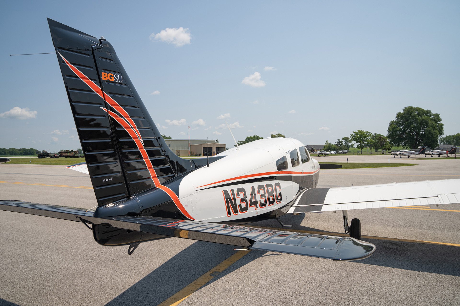 A BGSU airplane sits on a tarmac