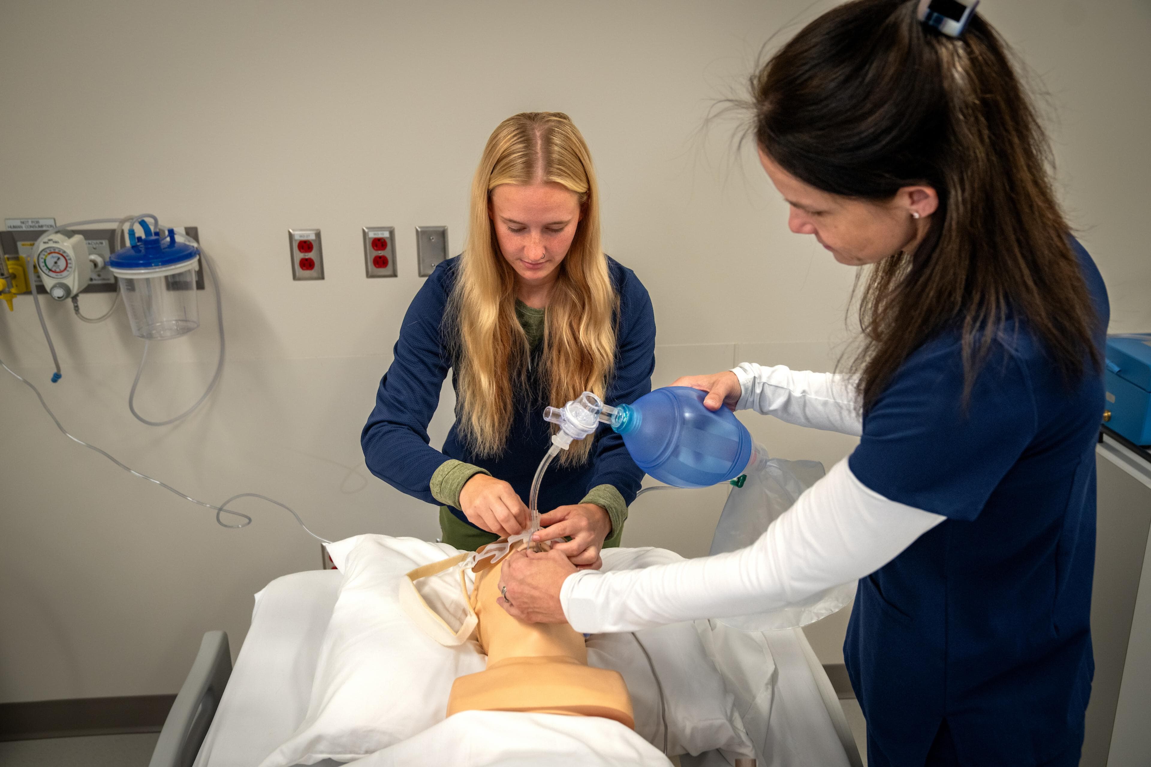 A student practices skills in BGSU Firelands respiratory care lab