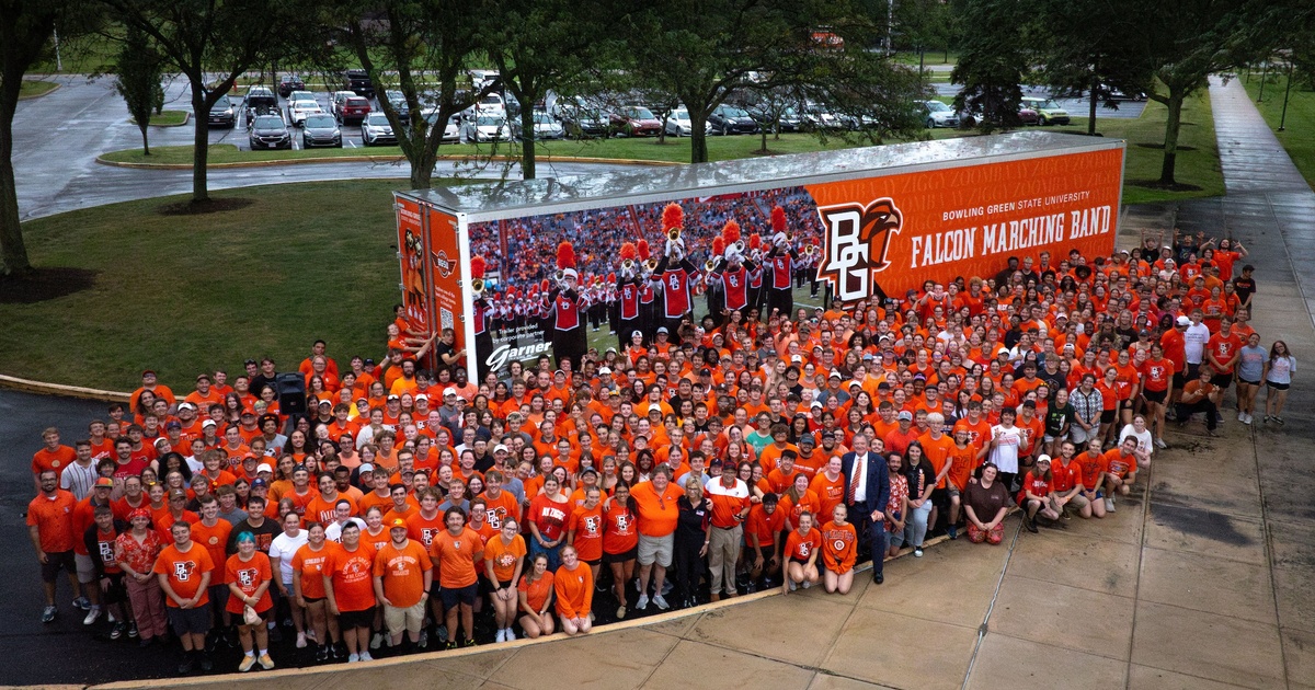 Findlay-based Garner Trucking surprises BGSU Falcon Marching Band with custom semitrailer