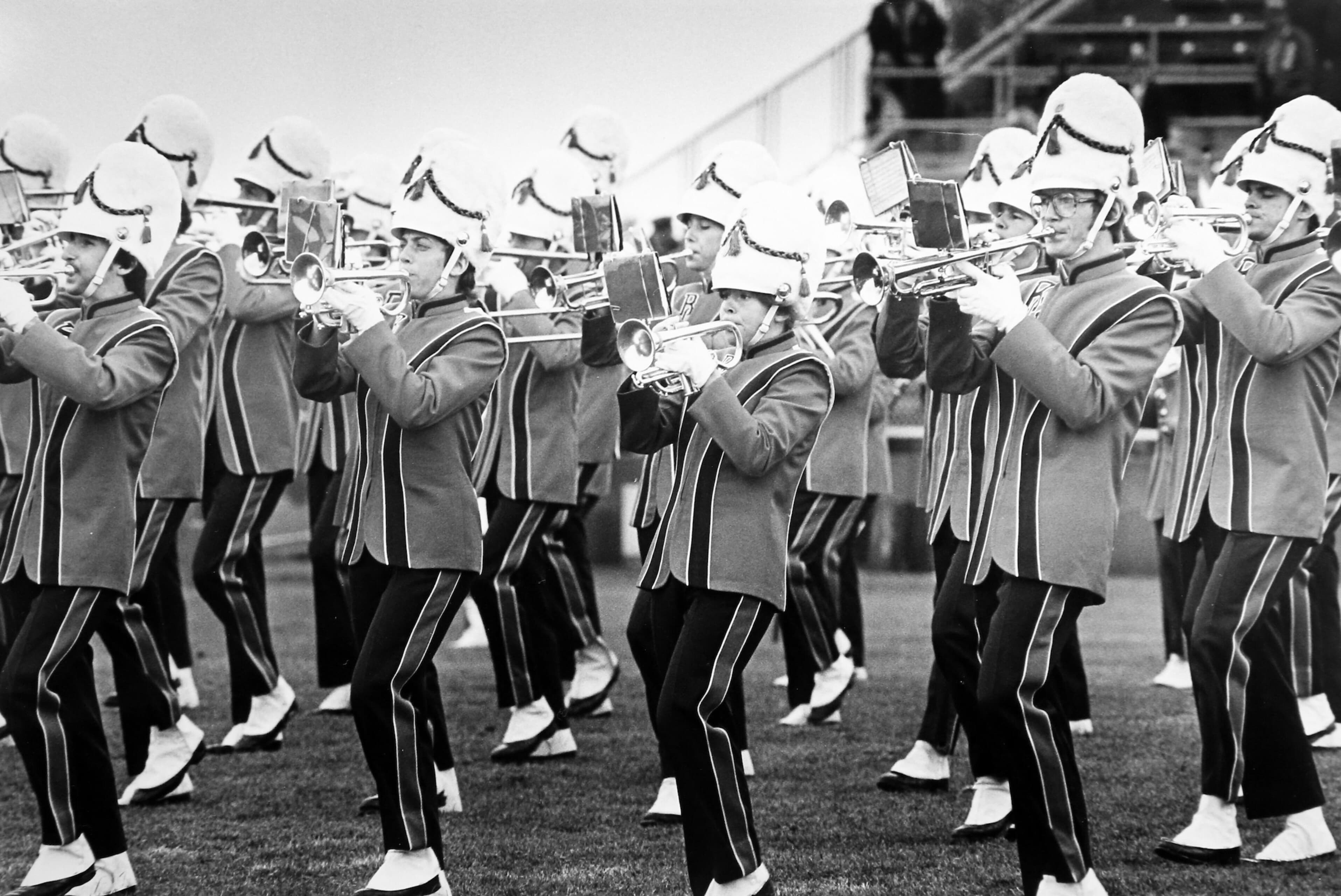 A black and white image of the band performing in the 1970s