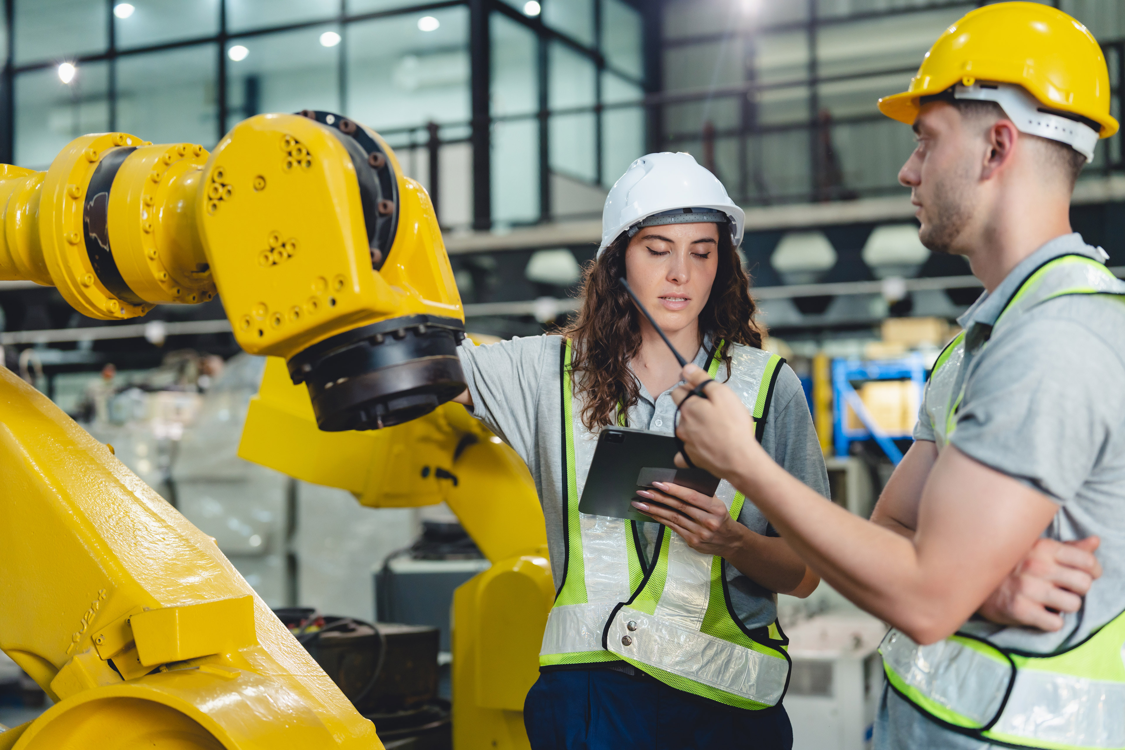 Technician Engineer in Factory, Maintaining and Repairing Robotic Arms Machinery, Ensuring Smooth Operation Automation in Manufacturing Process, Advanced Technology for Efficient Production innovation