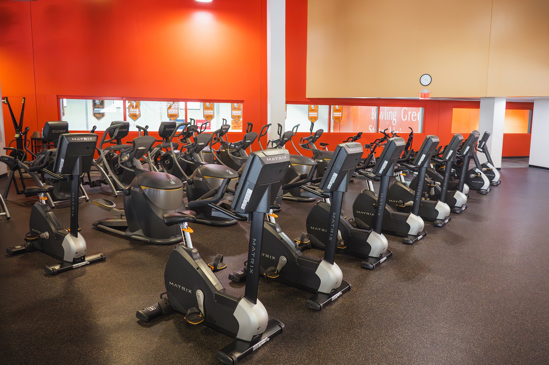 Cardio fitness area with treadmills, bikes, and ellipticals