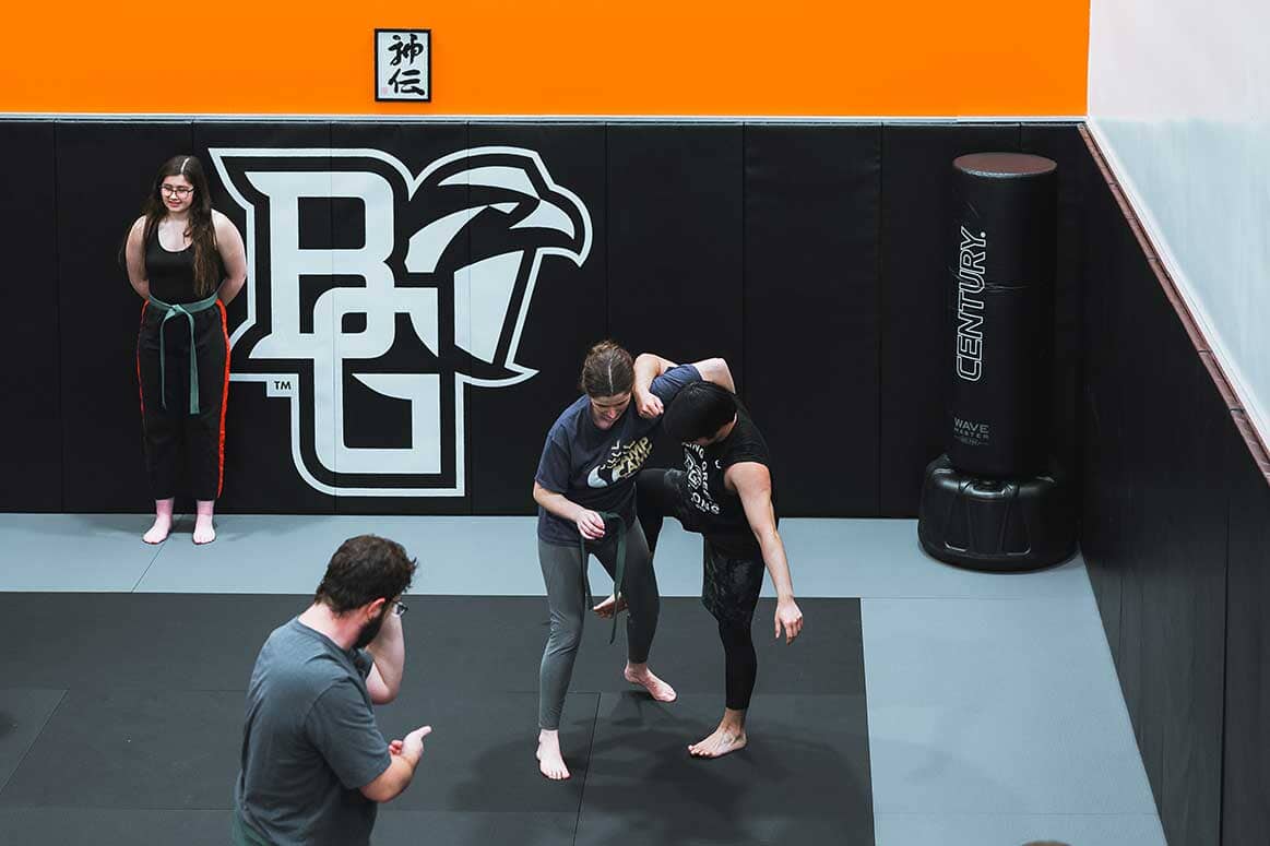 Two people wrestling