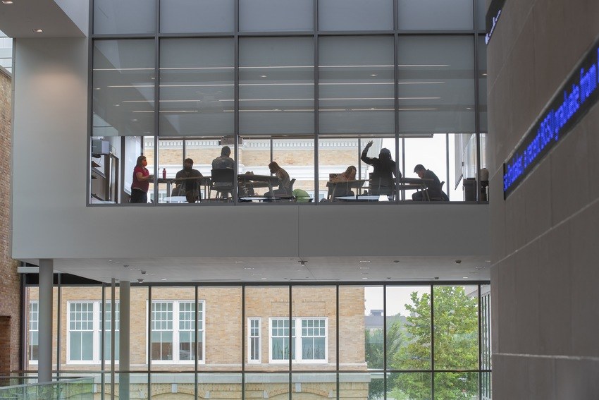 Classroom through windows, in the Maurer Center as seen from the atrium