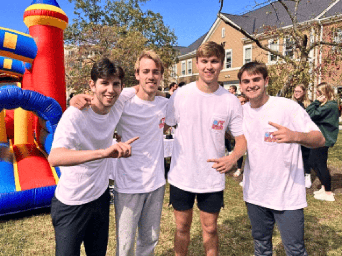 group of students passing out blankets