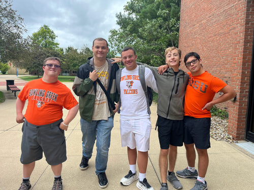 Joe Pawsey, Eben Prettyman, James Selos, Carter Nielsen, and Sam West standing outside George Mylander Building.