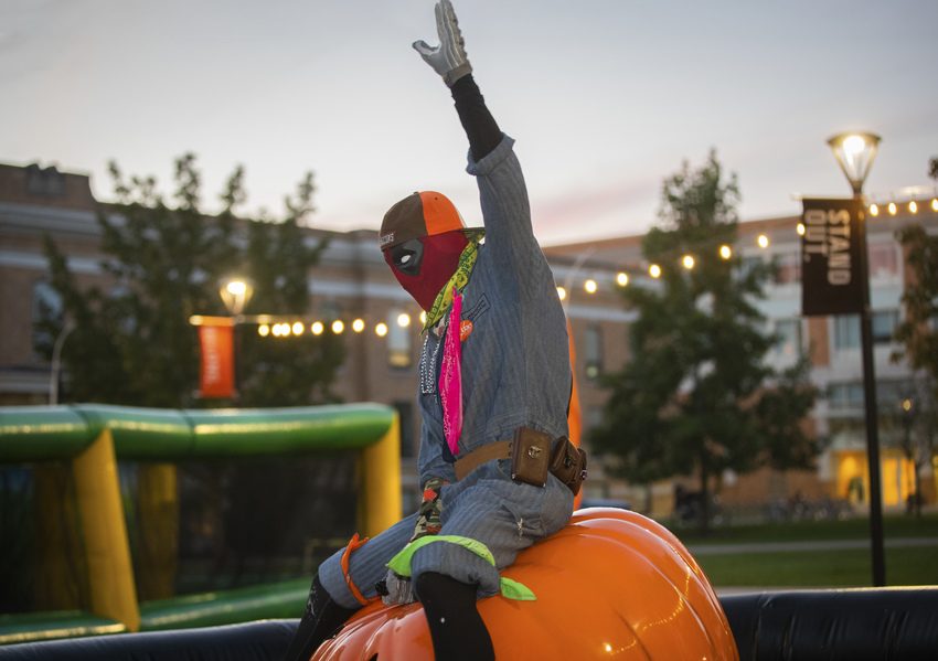 SICSIC (Deadpool) takes a ride on the bucking pumpkin during Fall Fest 2021