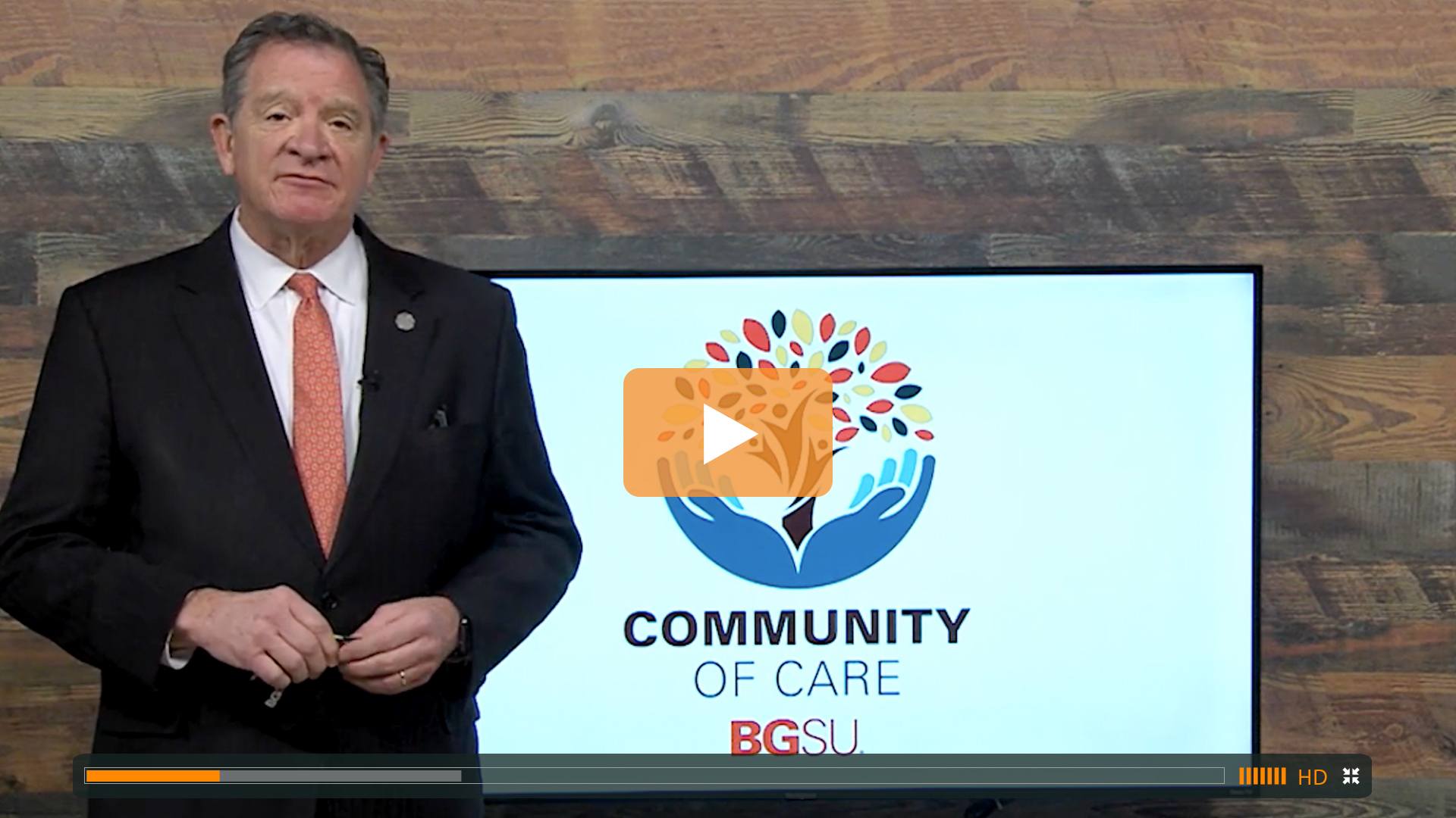 Thumbnail image of BGSU President speaking in front of tv screen